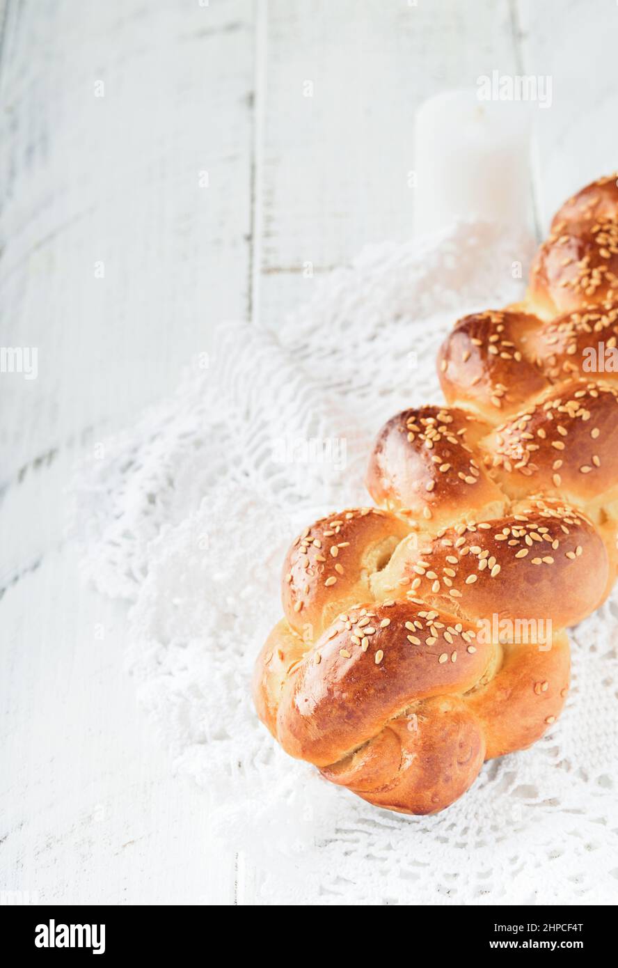 Challah bread. Sabbath kiddush ceremony composition. Freshly baked homemade braided challah