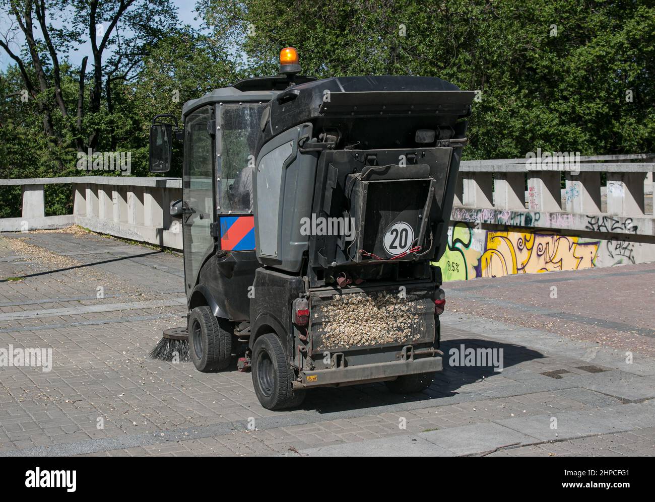 Close-up sweeper machine cleaning. Concept clean streets from debris ...