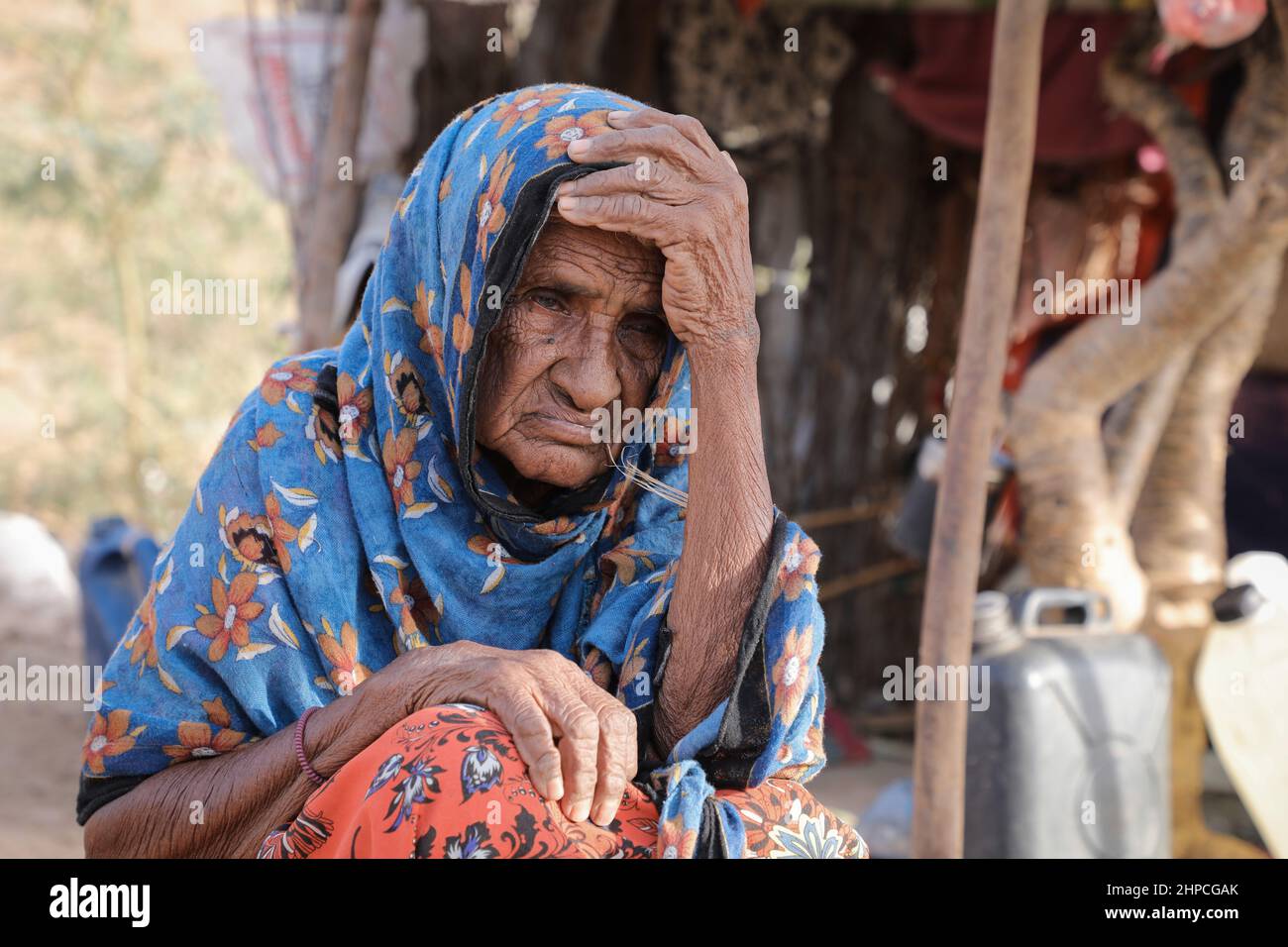 Taiz Yemen - 18 Feb 2022 : An elderly woman lives with her family in the camps for displaced people from the war in the city of Taiz Stock Photo