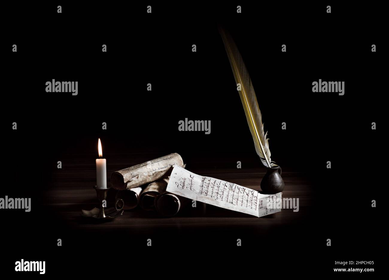Medieval writing utensils with candle Stock Photo Alamy