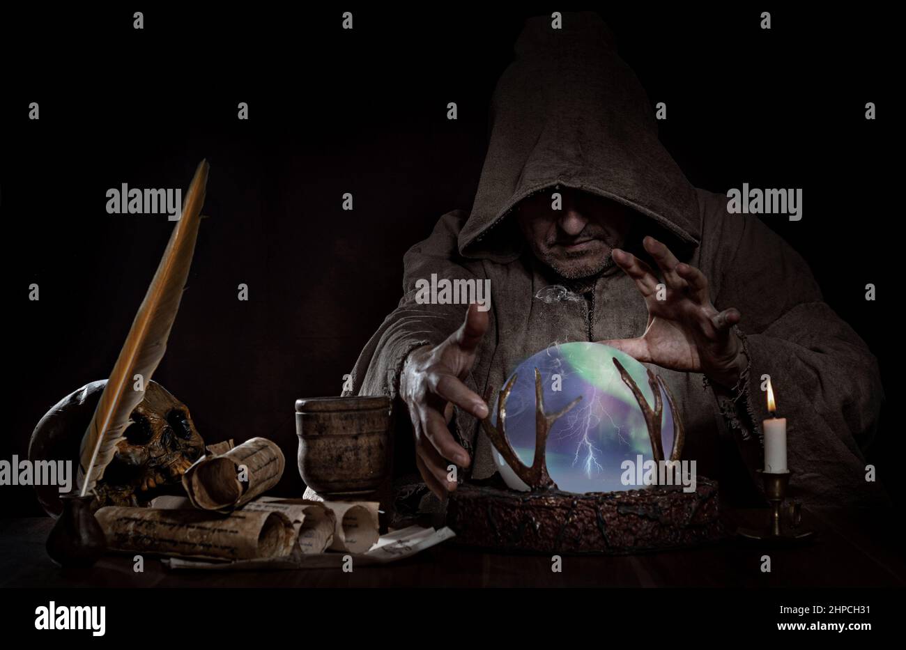 Medieval fortune teller and sorcerer Stock Photo