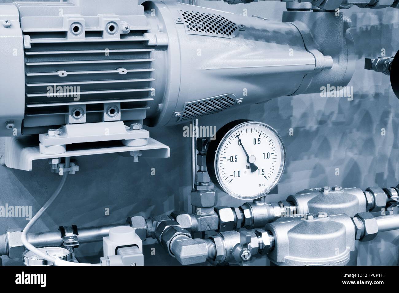 Pressure meters, pipes, filter,  faucet valves of heating system in a boiler room Stock Photo