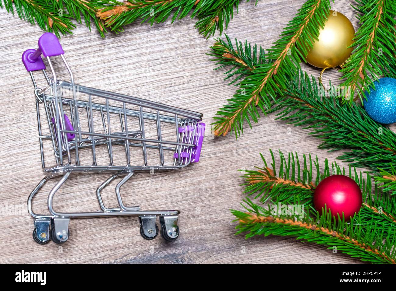 Trolley . Branches of a Christmas tree. Cart . Concept for Christmas