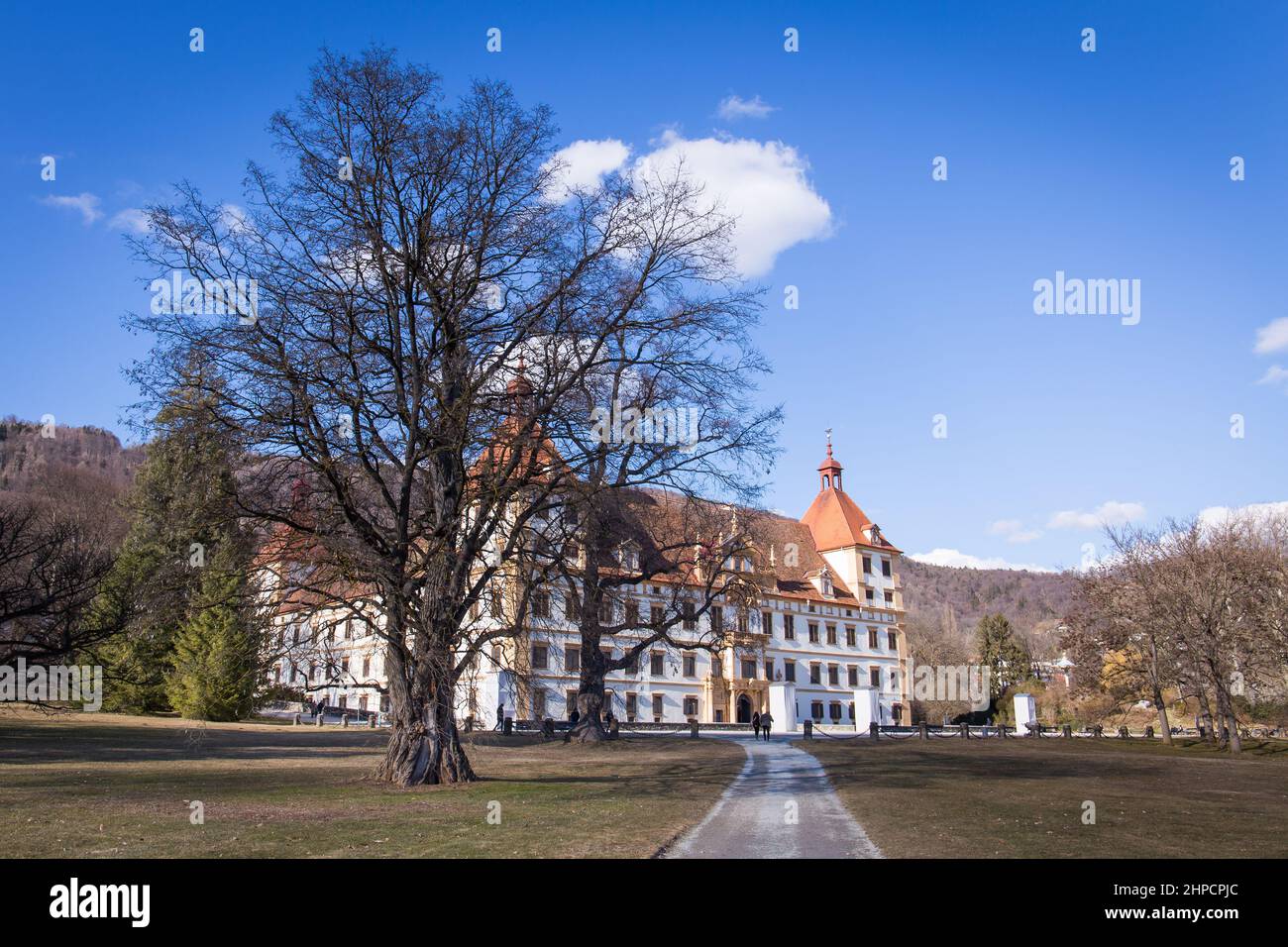 The baroque Schloss Eggenberg castle with its park in Graz, Austria during Winter Stock Photo