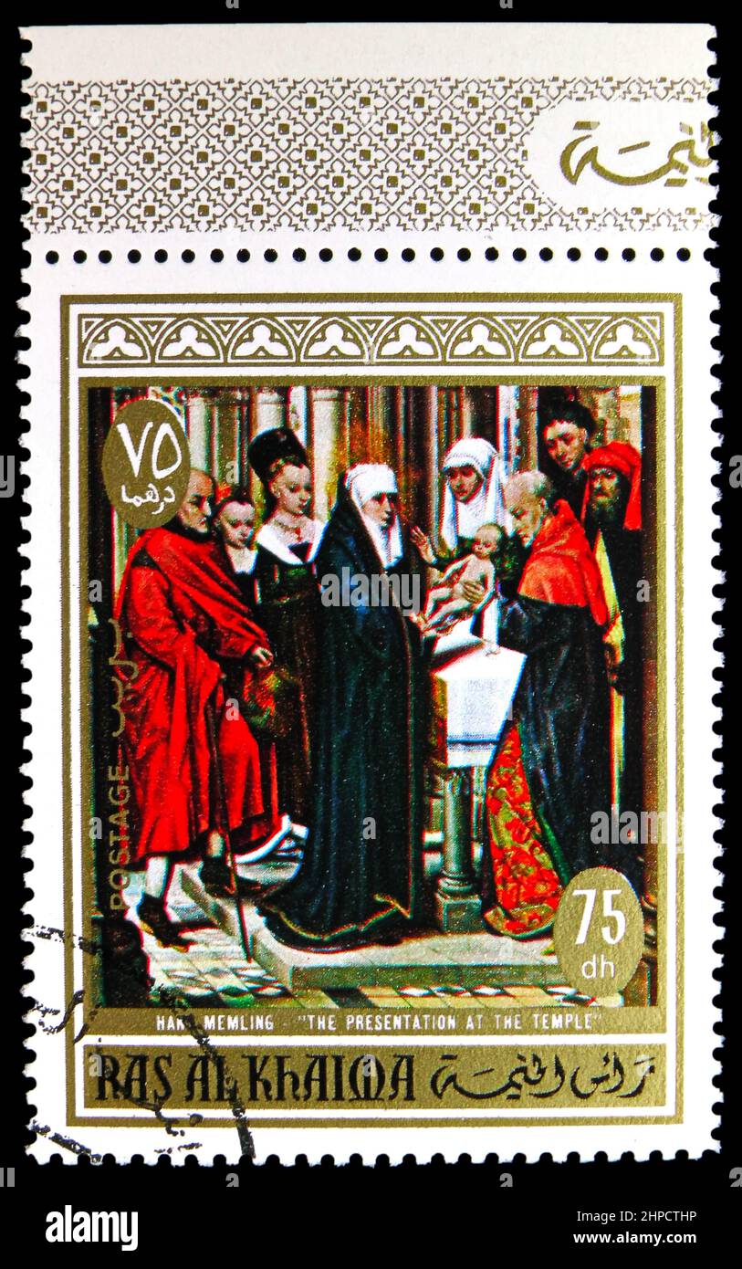 MOSCOW, RUSSIA - NOVEMBER 4, 2021: Postage stamp printed in Ras Al Khaimah shows Presentation in the Temple; by Hans Memling (1433-1494), The life of Stock Photo