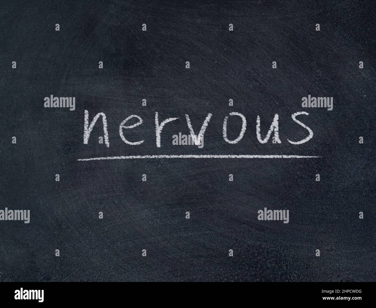 nervous concept word on blackboard background Stock Photo Alamy