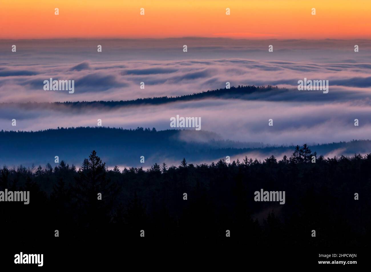 Beautiful sunset in nature during temperature inversion. Natural ...