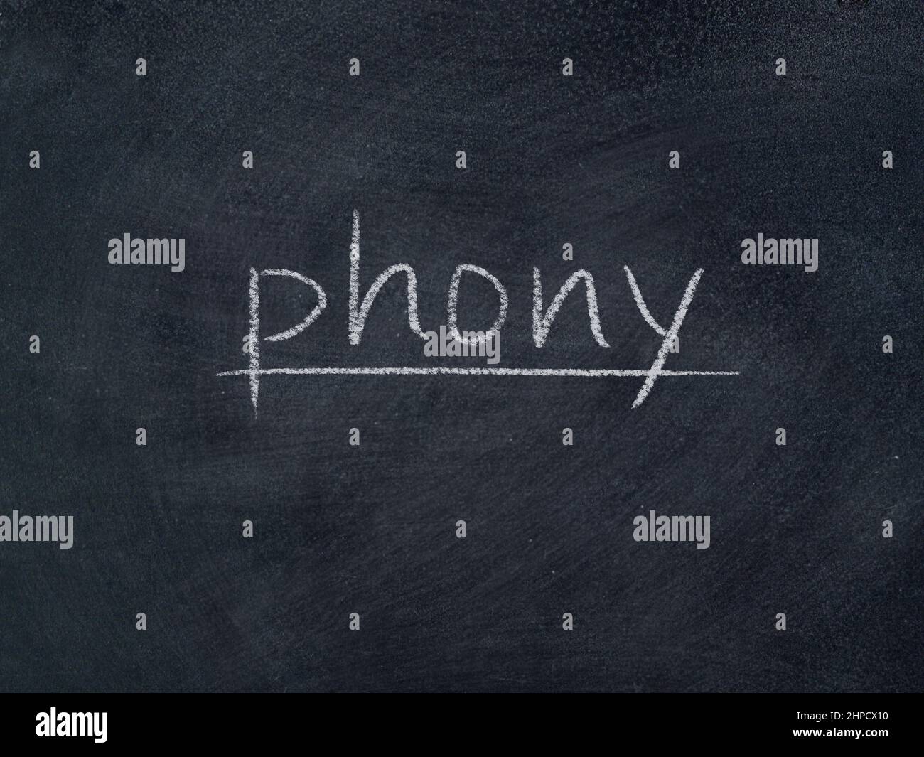 phony concept word on blackboard background Stock Photo