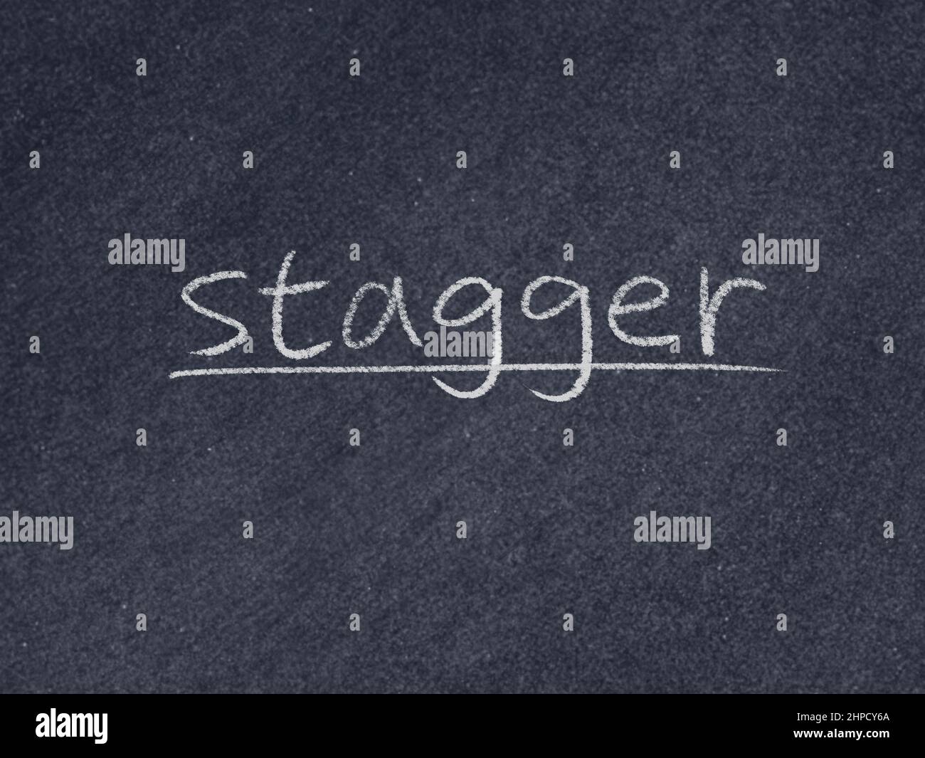 stagger concept word on blackboard background Stock Photo