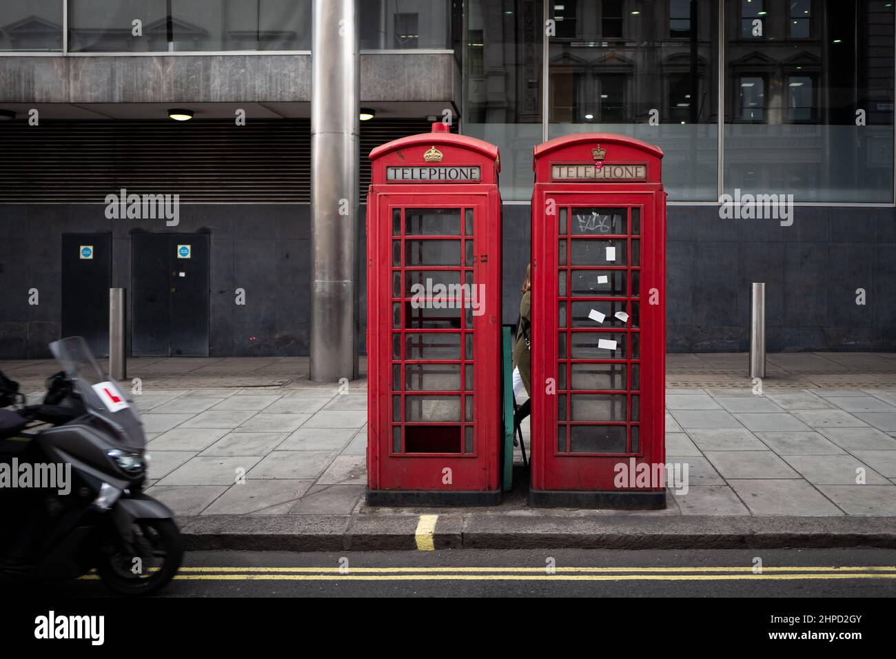 Two traditional London red telephone boxes near Mayfair, London UK Stock Photo