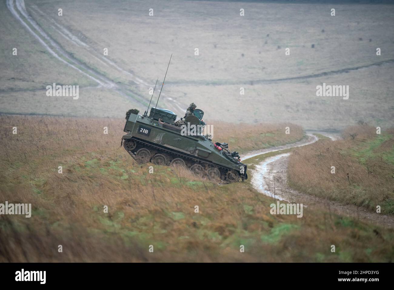 british army FV103 Spartan light armored vehicle in action on a
