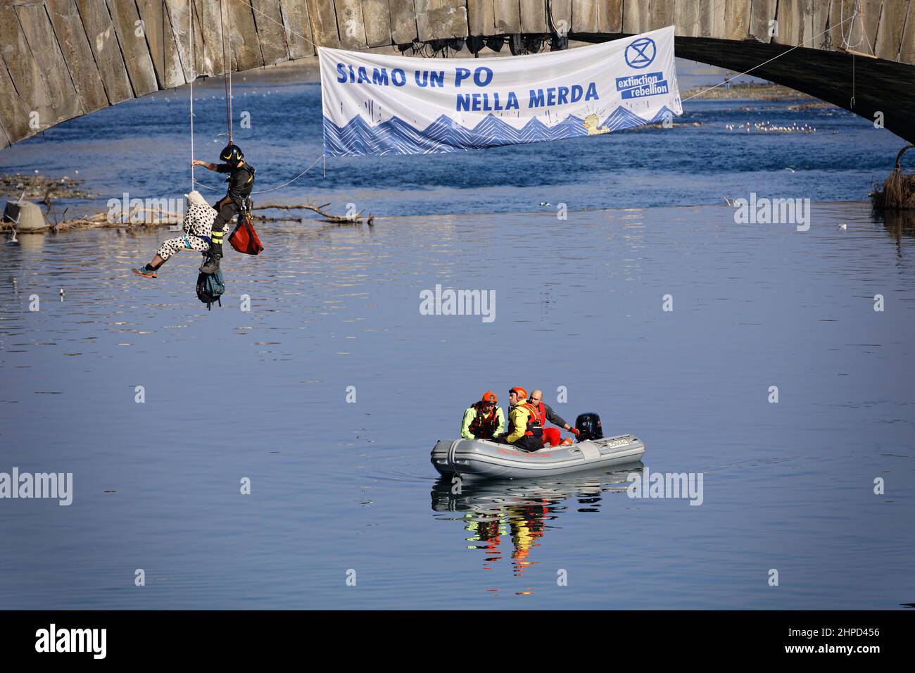 Turin, Italy. 20th Feb, 2022. Activists of Extinction Rebellion protest to denounce the inertia of the Piedmont Region towards the climate crisis. Activists are rescued by firefighters. Credit: MLBARIONA/Alamy Live News Stock Photo