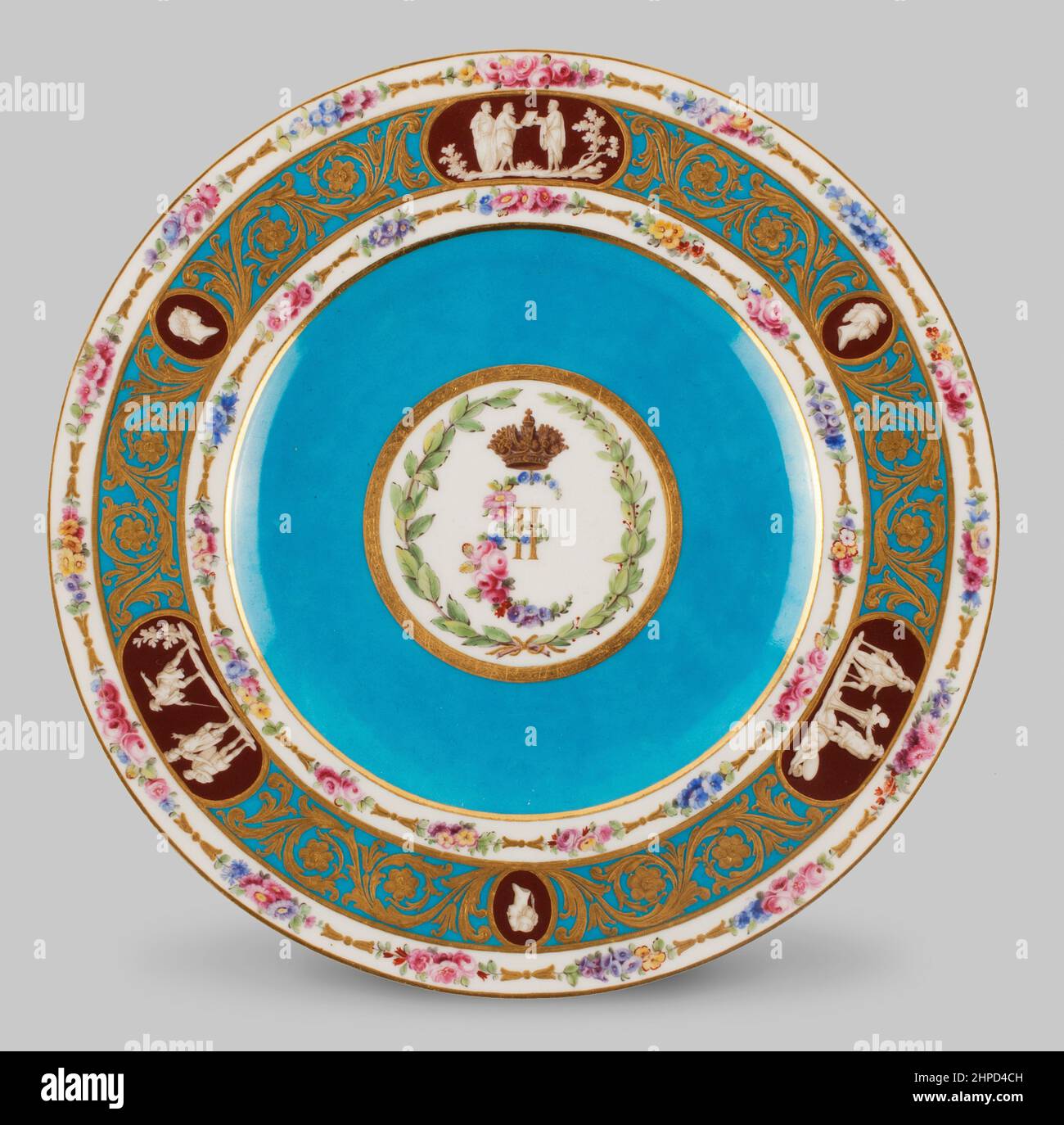Gilded plate from Catherine the Great’s (1729–1796) dinner service made by Sèvres Porcelain Manufactory in 1778. Stock Photo