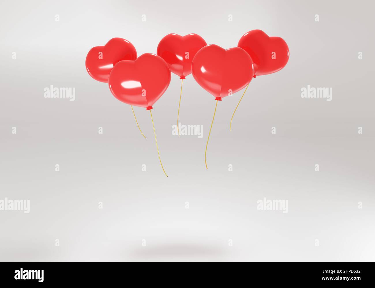 3d red balloons in the shape of a heart on a white background. Festive ...