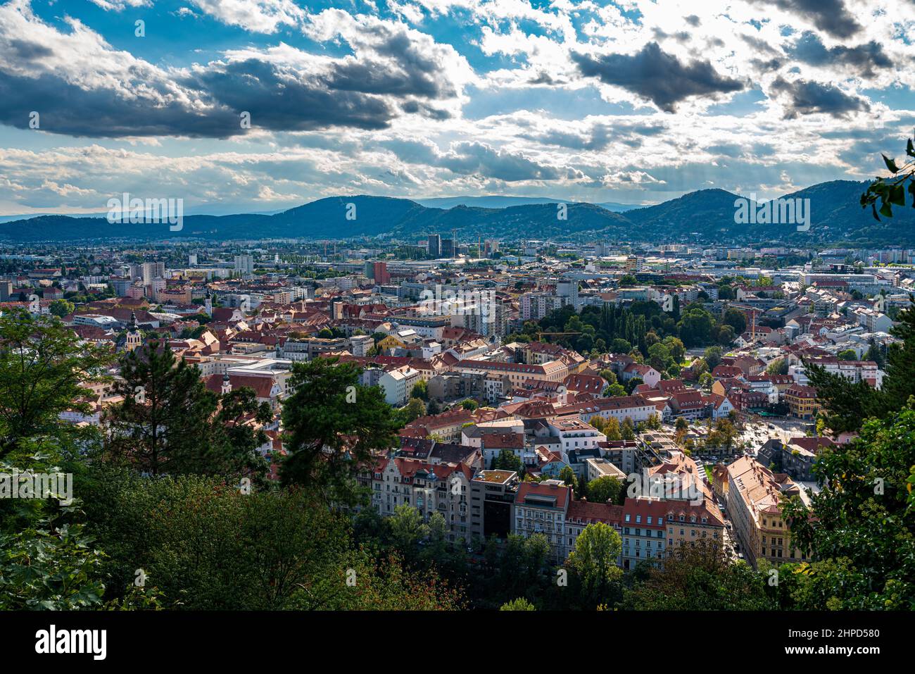 Beautiful aerial panorama view of Graz old town from top of Schlossberg in summer on a sunny day with blue sky cloud, Graz, Styria, Austria Stock Photo