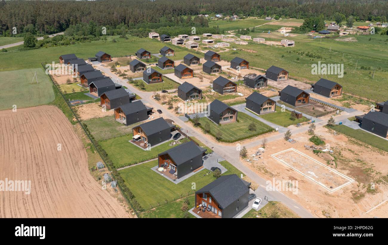 New Housing Estate from Above with Newly Built Private Homes Real estate or mortgage concept Stock Photo