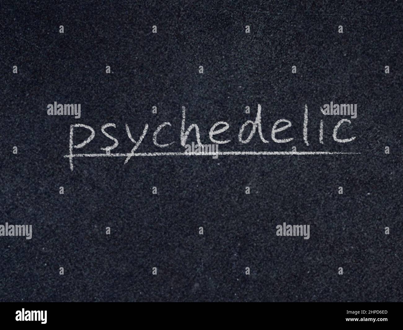 psychedelic concept word on blackboard background Stock Photo