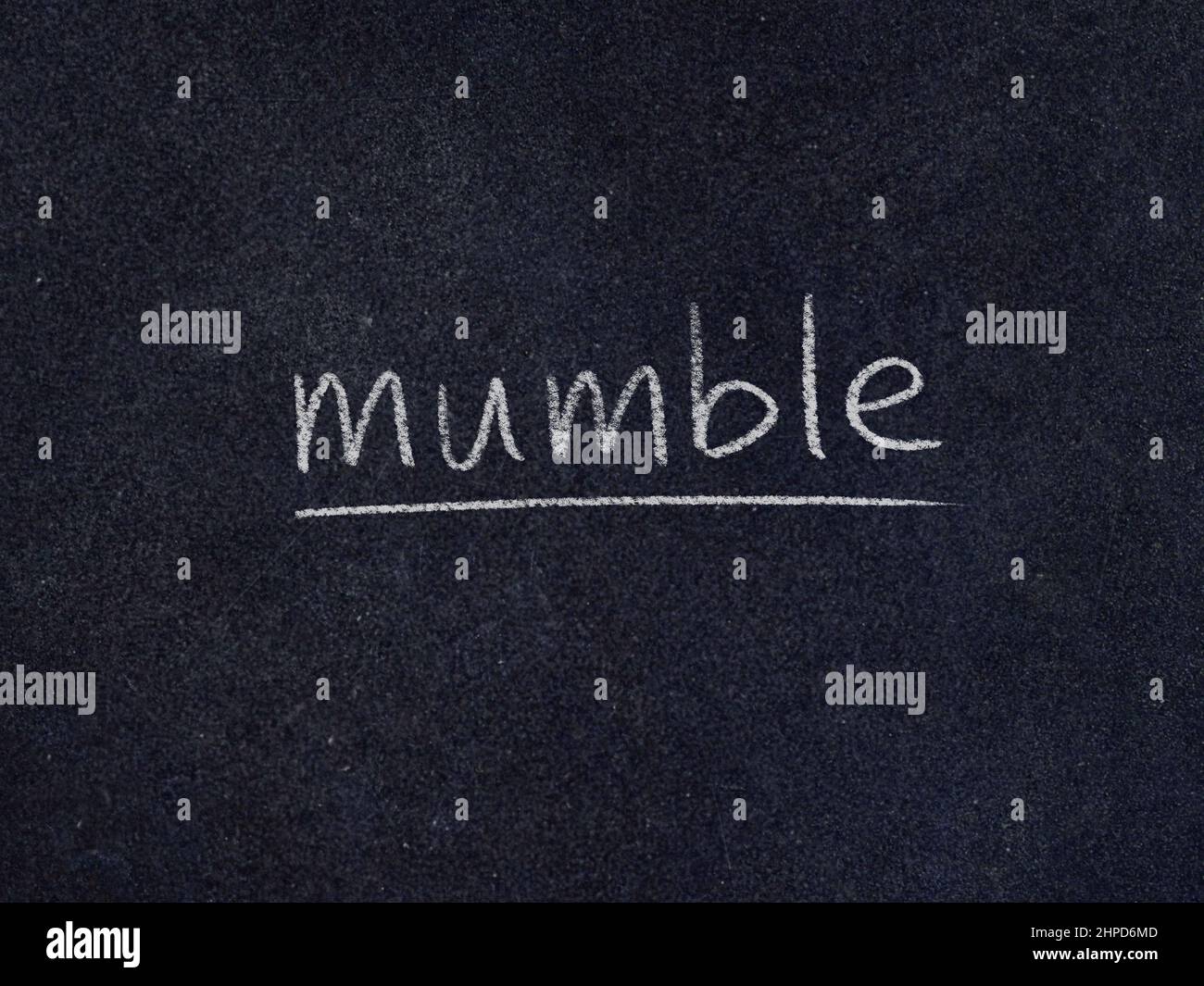 mumble concept word on blackboard background Stock Photo