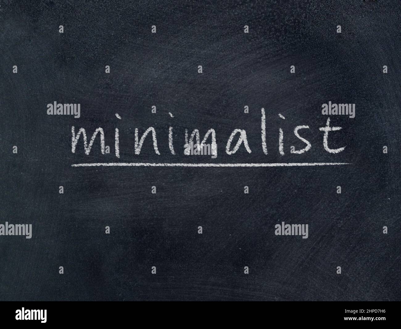 minimalist concept word on blackboard background Stock Photo