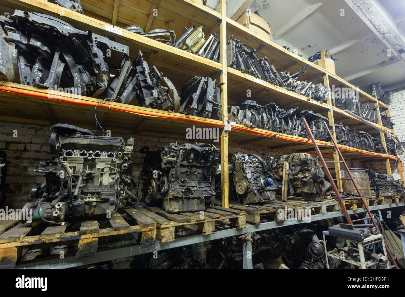 Warehouse with used auto parts for sale. Radiators of the cooling system and engines on the