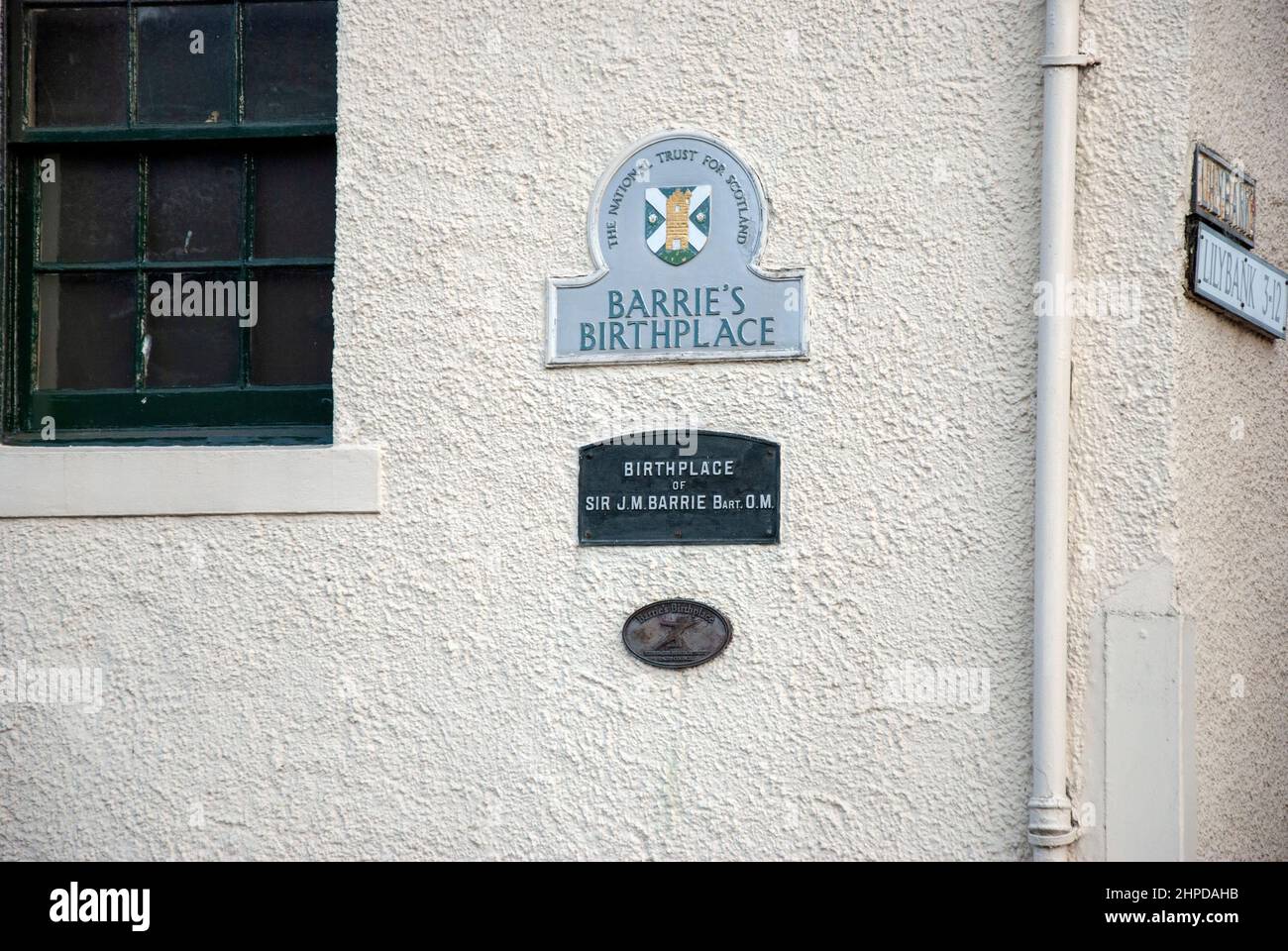 Birthplace of Sir James Matthew J.M. Barrie Brechin Road Kirriemuir Angus Scotland United Kingdom close up commemorative plaques exterior view 19th ce Stock Photo