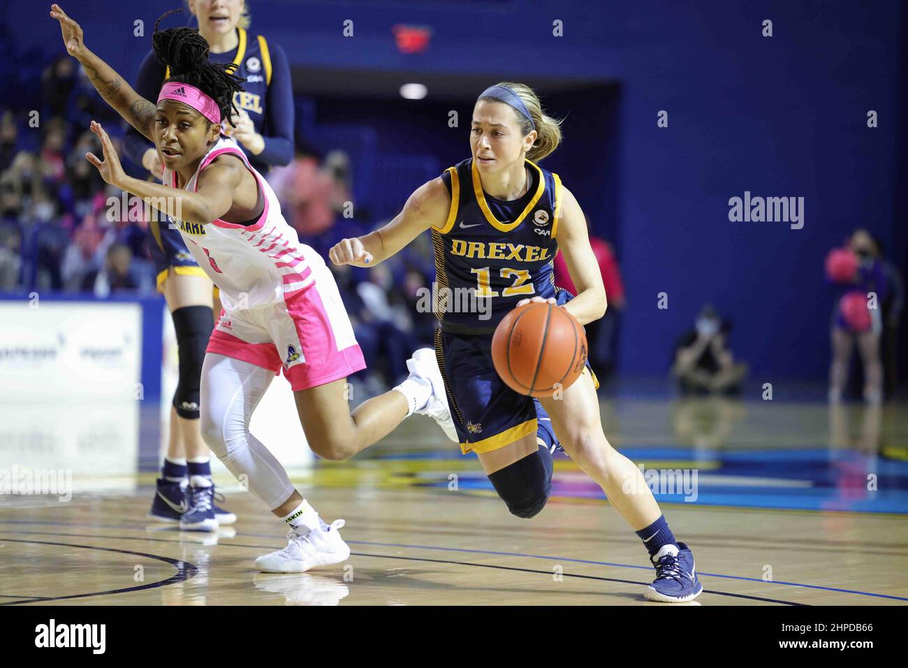 Newark, DE, USA. 20th Feb, 2022. Drexel Guard HANNAH NIHILL (12) drives to  the lane as Delaware Guard TYI SKINNER (3) defends during a Colonial  Athletic Association regular season basketball game Sunday,