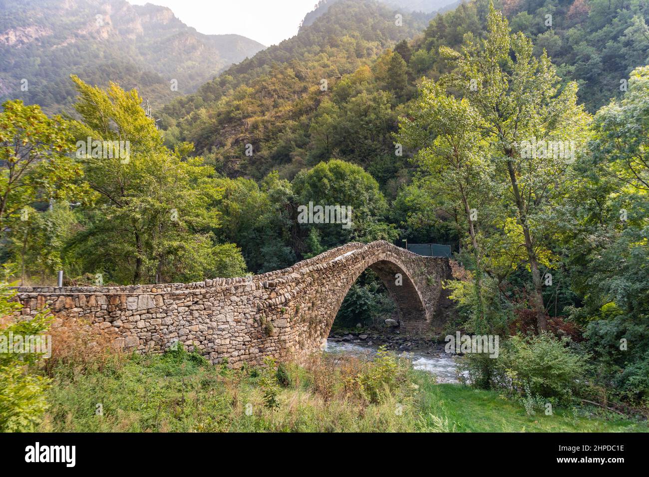 Roman bridge made of stone near Andorra La Vella Stock Photo