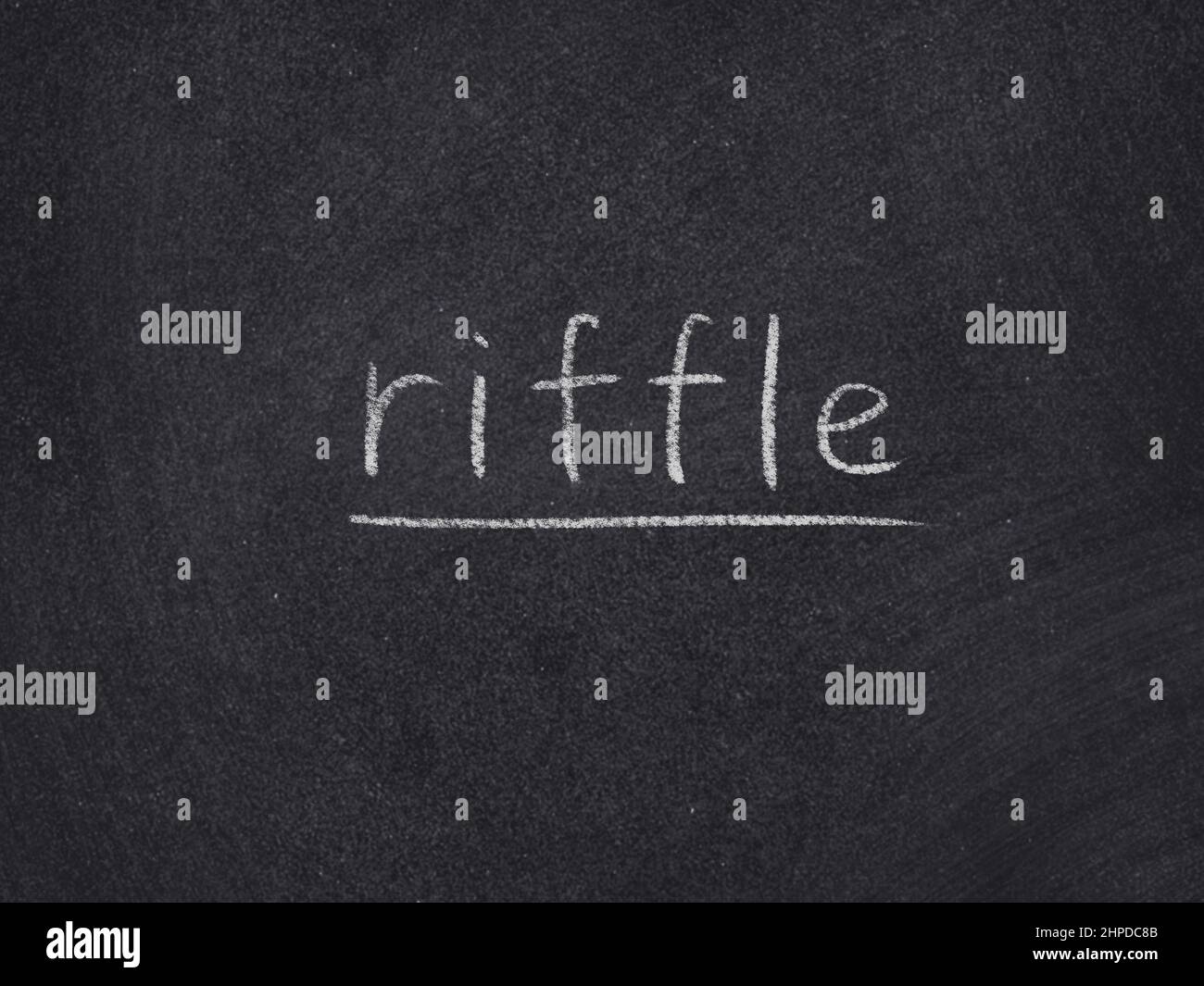 riffle concept word on blackboard background Stock Photo