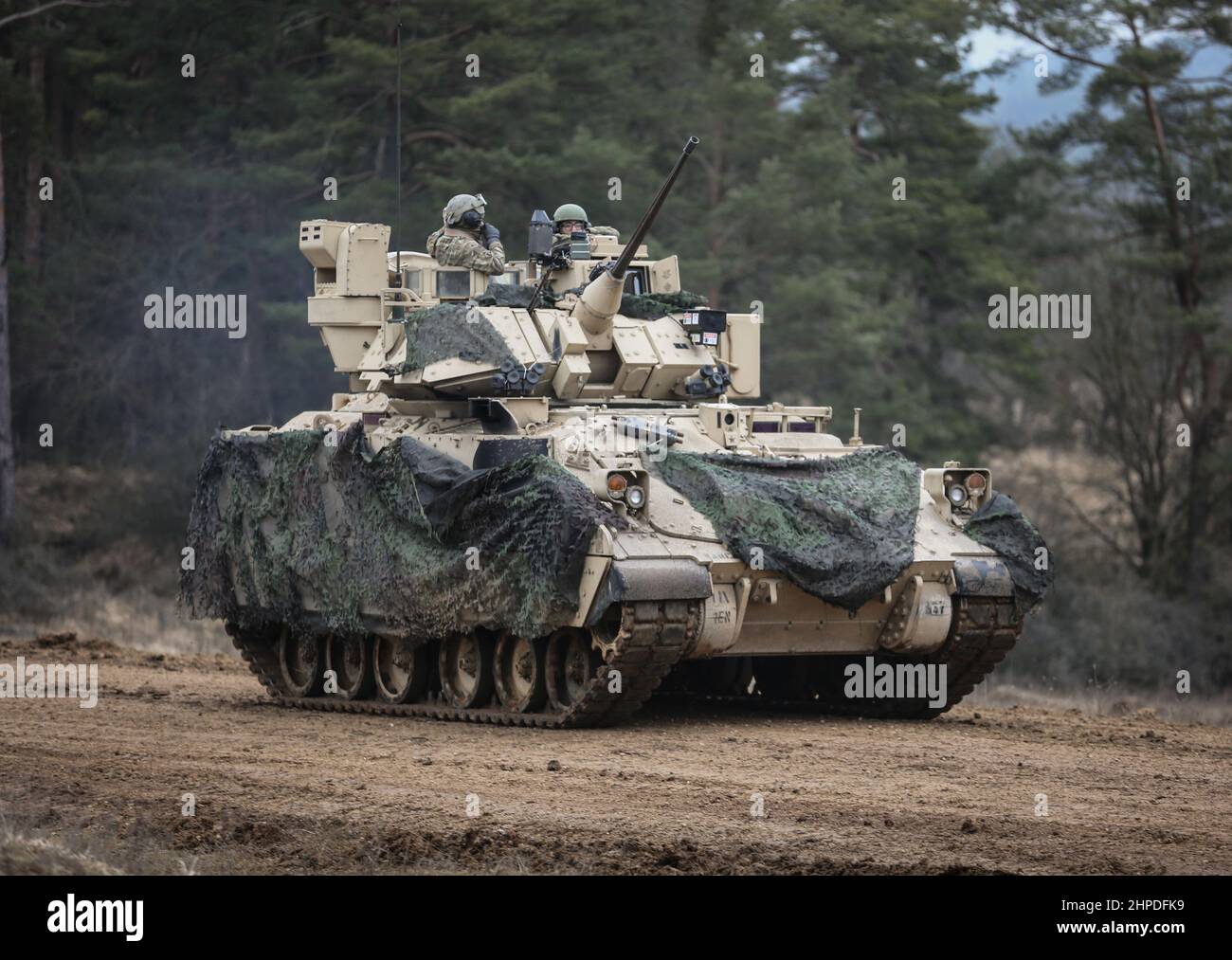 U.S. Army soldiers conduct field maintenance at Hohenfels Training Area, Germany, Jan 26, 2022. Allied Spirit 22 is a United States Army Europe-Africa (USARURAF-AF) directed, 7th Army Training Command conducted, Joint Multinational Readiness Center (JMRC) hosted training exercise for NATO allies and partners from 11 Jan 22 to 05 Feb. The exercise will develop and enhance NATO and partner interoperability and readiness across specific warfighting functions. Stock Photo