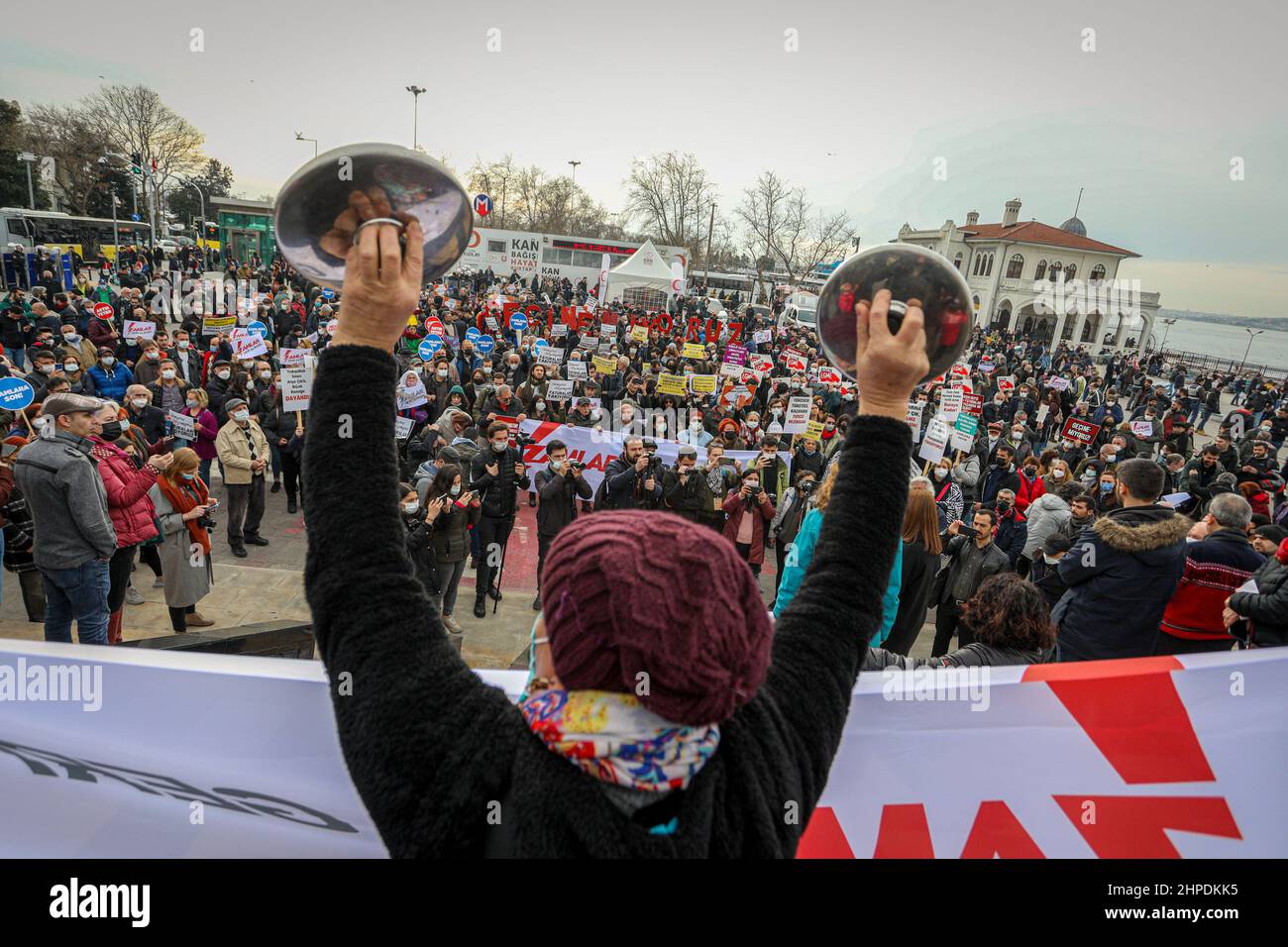 Istanbul, Turkey. 20th Feb, 2022. A protester shows the pan lids, which ...