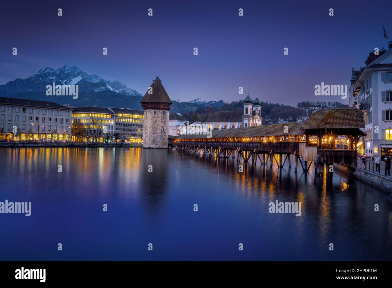 Chapel Bridge (Kapellbrucke) and Luzern Skyline at night - Lucerne, Switzerland Stock Photo