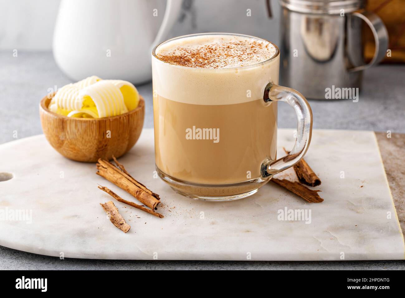 Bulletproof coffee with grass fed butter and MCT oil Stock Photo