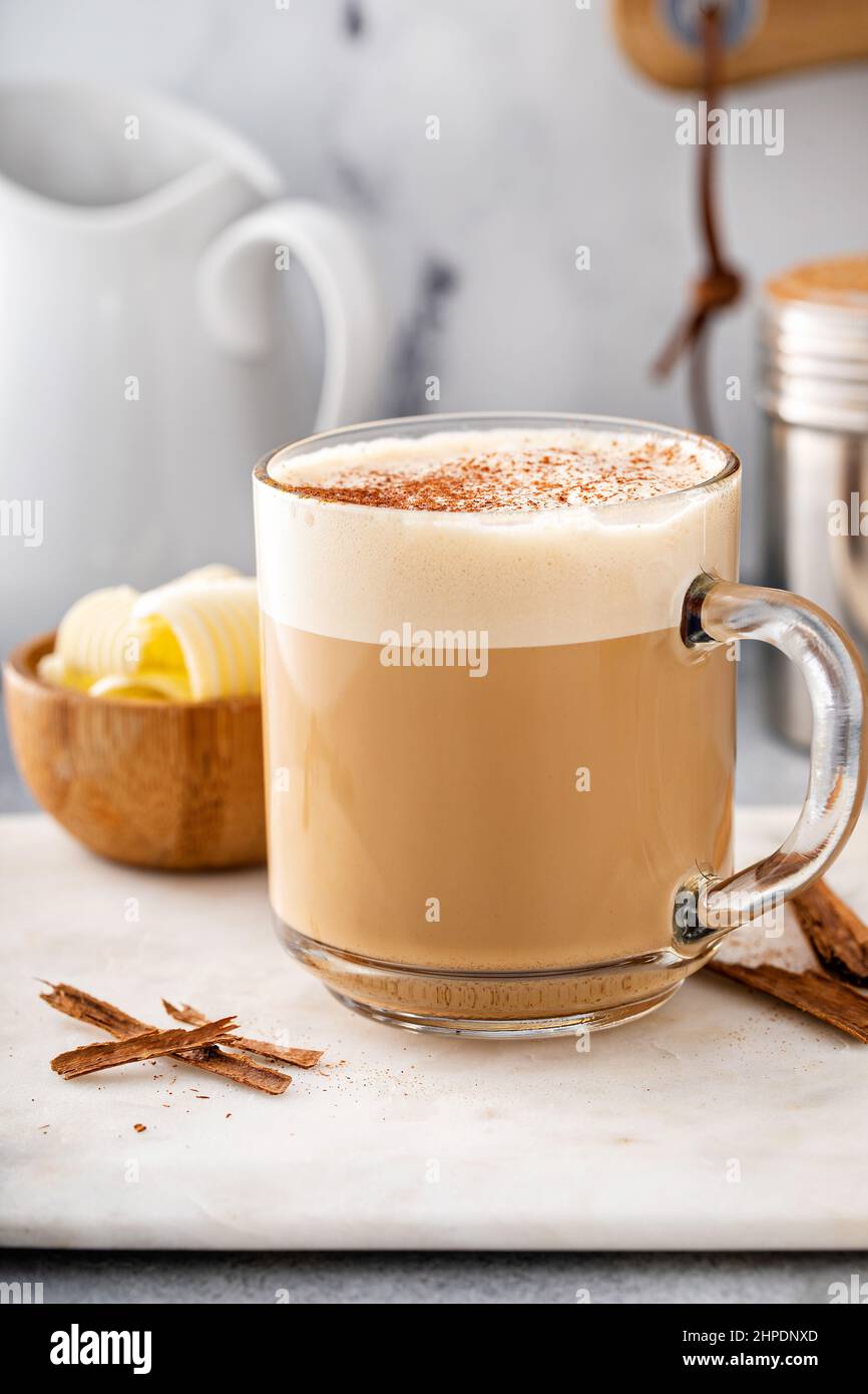 Bulletproof coffee with grass fed butter and MCT oil Stock Photo