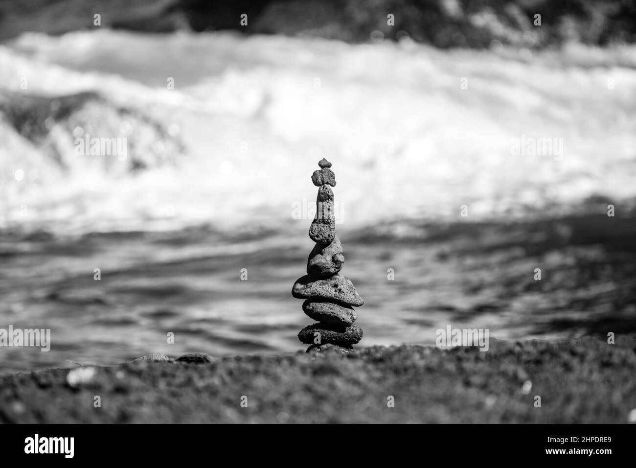 Pyramid of sea pebbles on beach. Life balance and harmony concept