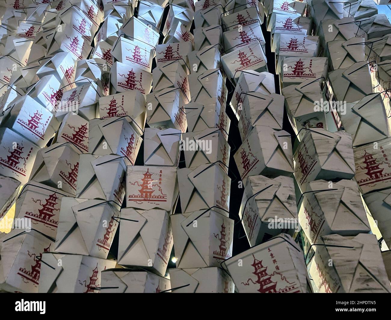 Togo Rack Tall stack of Asian togo containers Stock Photo - Alamy