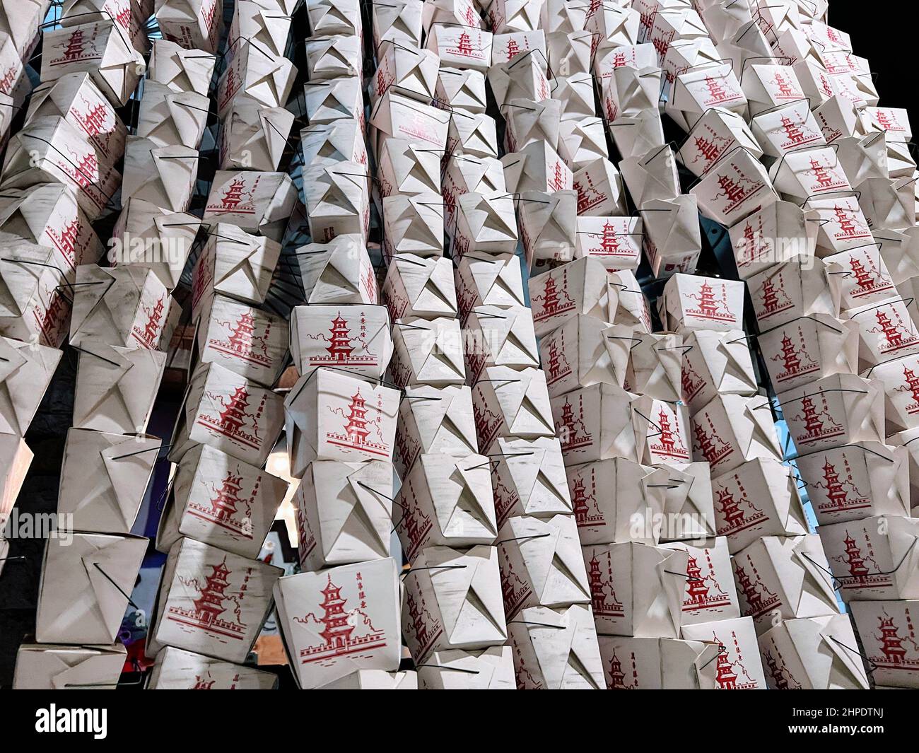 Togo Rack Tall stack of Asian togo containers Stock Photo - Alamy