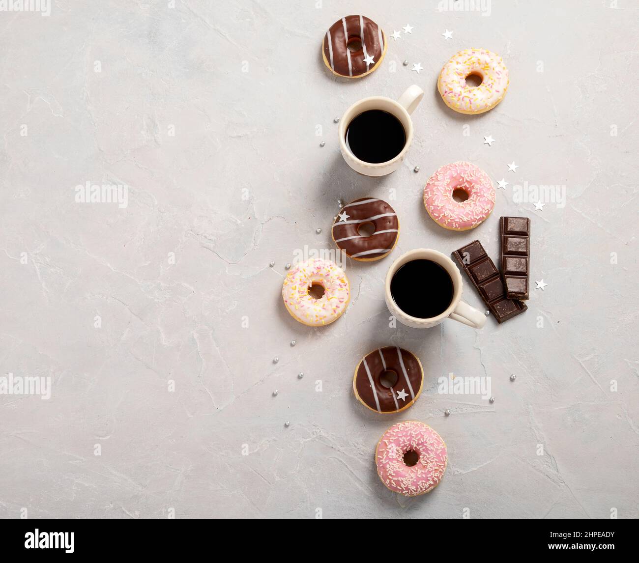 fresh donut with coffee on grey background, copy space Stock Photo Alamy