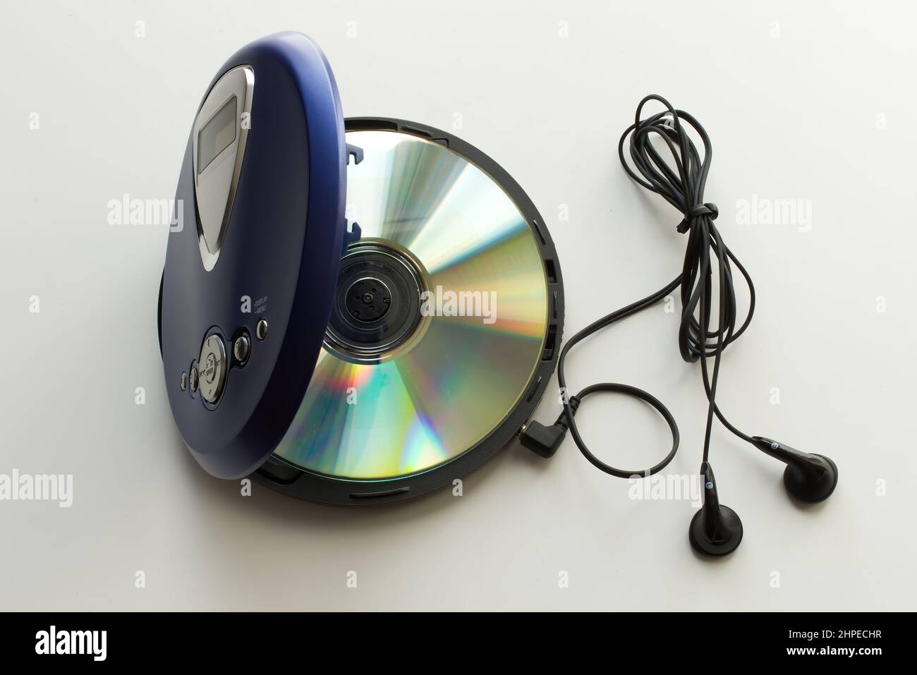Vintage CD Player with headphones on white background. Vintage Technology from the 90s Stock