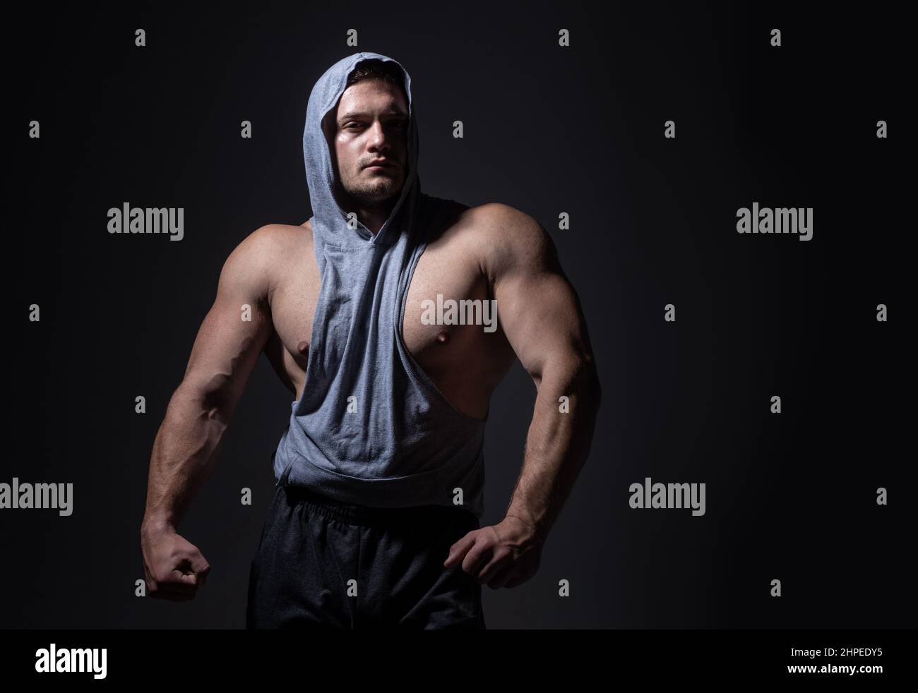 Brutal man, handsome serious male model. Strong muscular male body, muscles  guy Stock Photo - Alamy