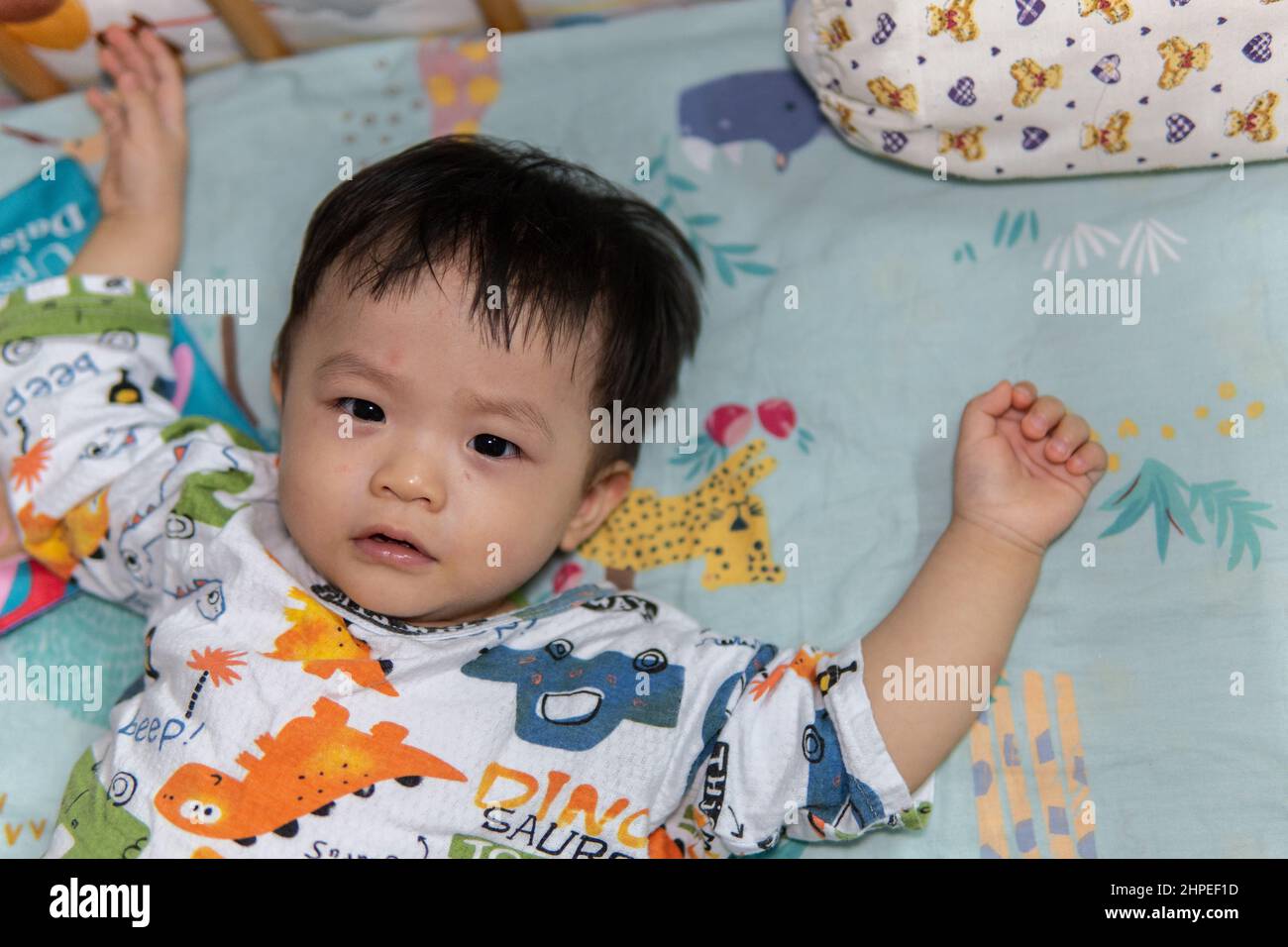 Portrait image of cute Asian Chinese 1 years old Asian Chinese baby boy