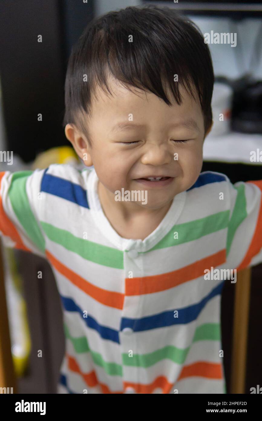 Portrait image of happy expression smile of Asian Chinese baby boy