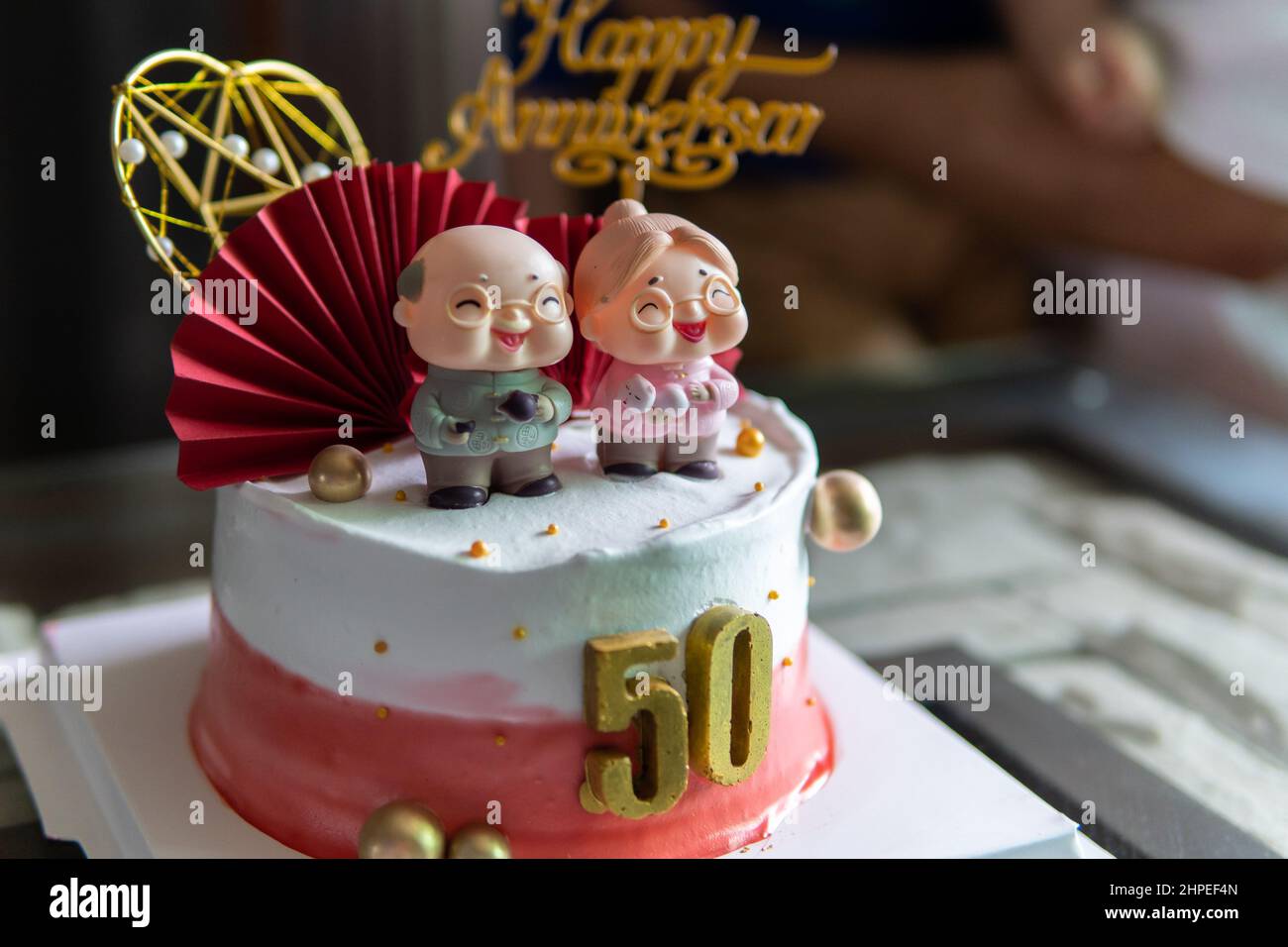 Local lifestyle Chinese style 50 years anniversary cake decoration for parents Stock Photo