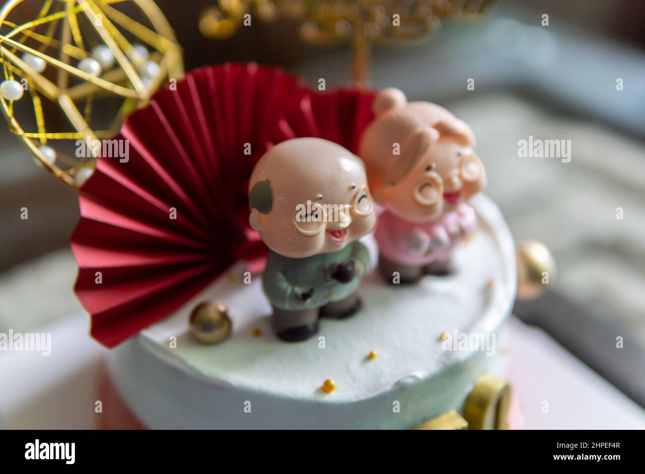 Local lifestyle Chinese style 50 years anniversary cake decoration for parents Stock Photo