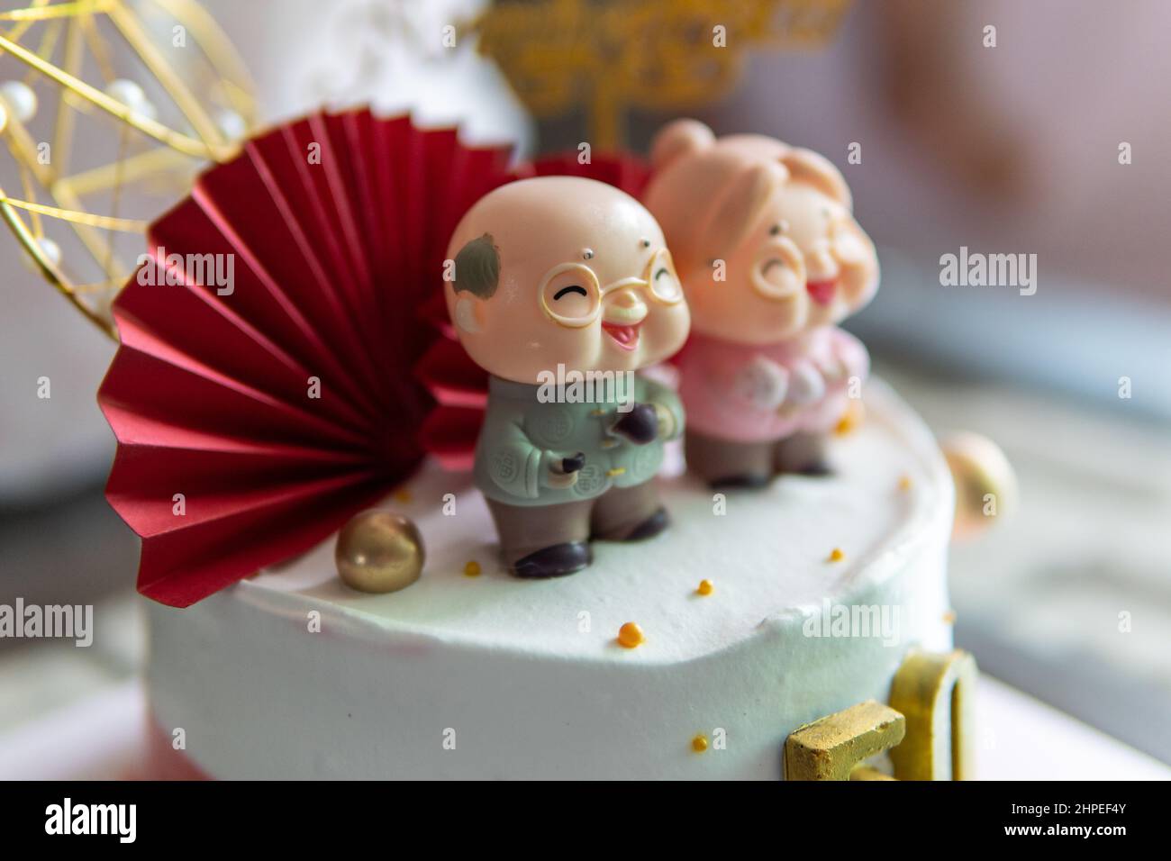 Local lifestyle Chinese style 50 years anniversary cake decoration for parents Stock Photo