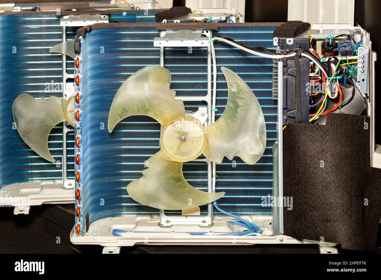 Fragment of the cooling system of the air conditioner with a radiator