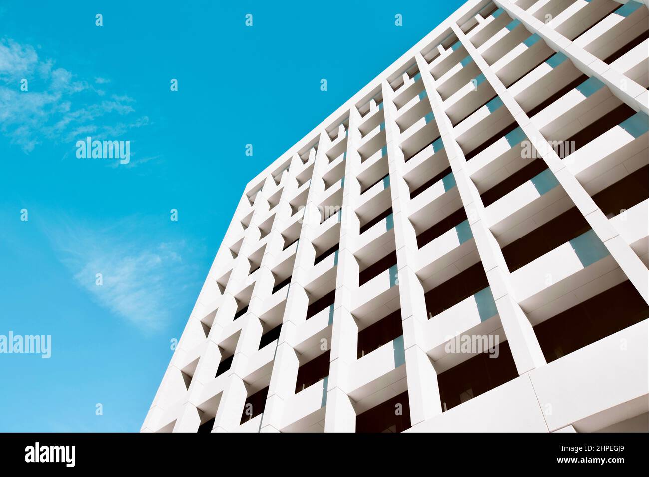 Modern architectural detail - white facade and blue sky Stock Photo