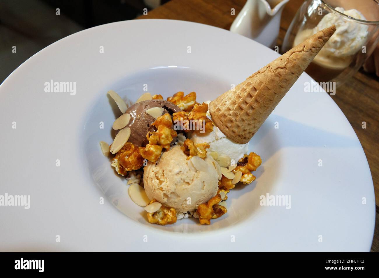 Close up Chocolate and Vanilla Ice cream waffle cone served with
