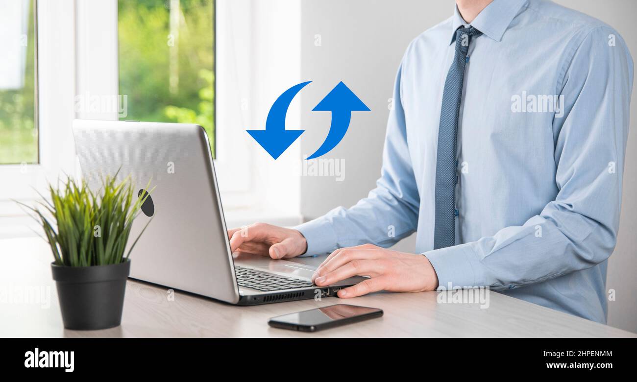 Cloud technology. Polygonal wireframe cloud storage sign with two arrows up and down on dark . Cloud computing, big data center, future infrastructure Stock Photo