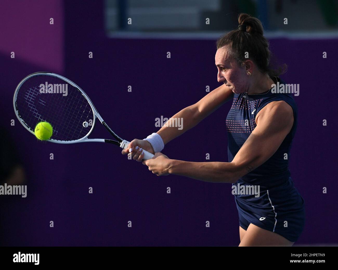 Doha, Qatar. 20th Feb, 2022. Ipek Oz of Turkey returns the ball during the  first round of WTA Qatar Open tennis tournament match against Madison  Brengle of the United States at the