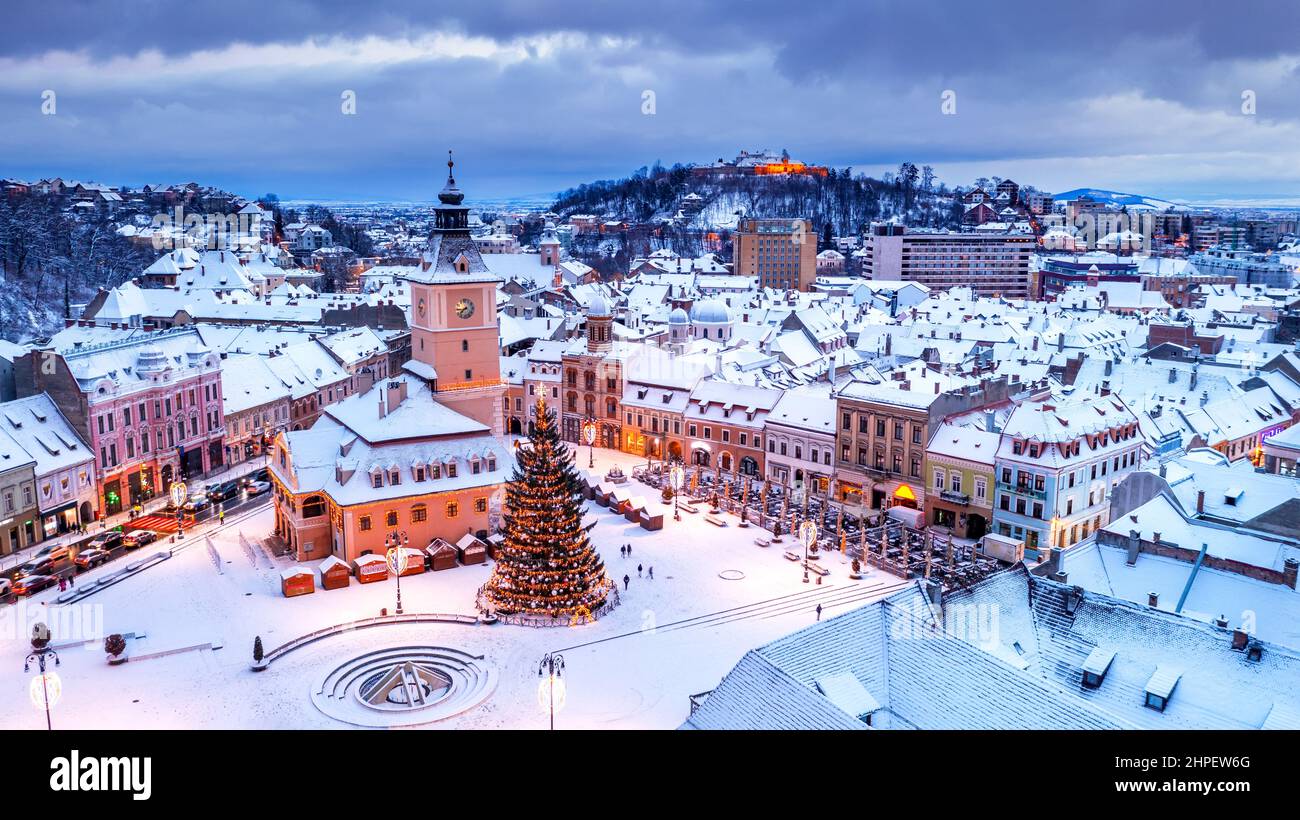 Brasov, Romania. Winter Christmas aerial view of Council Square and Christmas Tree, Transylvania landmark, Eastern Europe Stock Photo